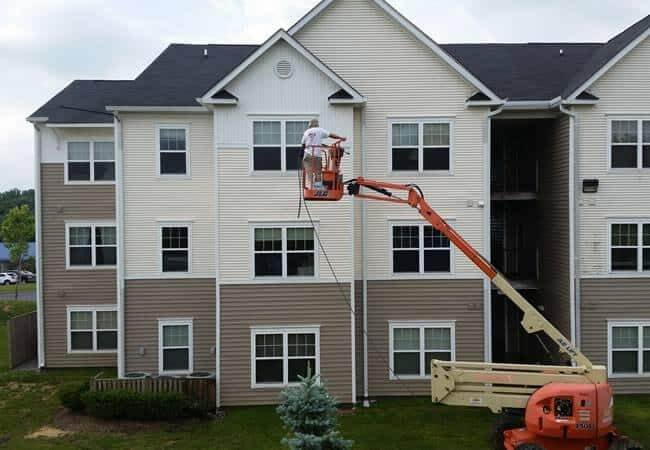 Katy Pressure Wash Expert Performing Exterior Building Power Wash Exterior Power Wash By Pressure Washing Katy